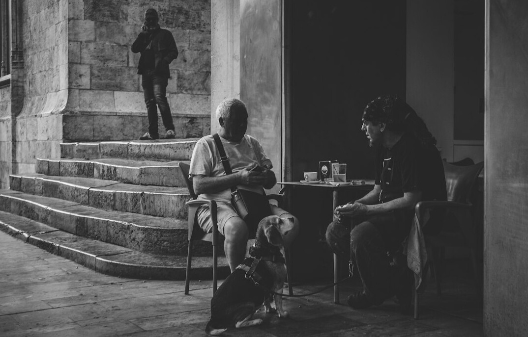 Photographer conducting a documentary interview session with a local resident
